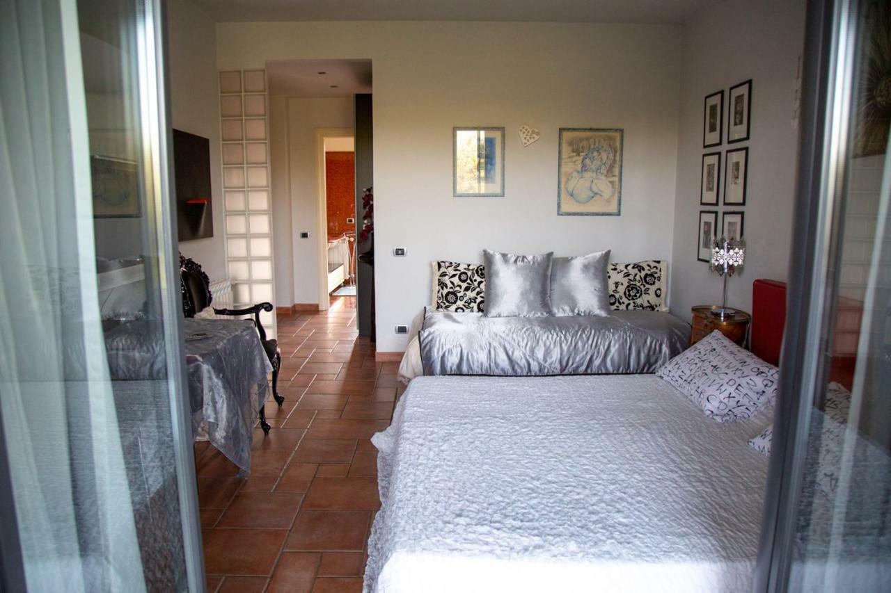 Suite con vasca doccia e balcone