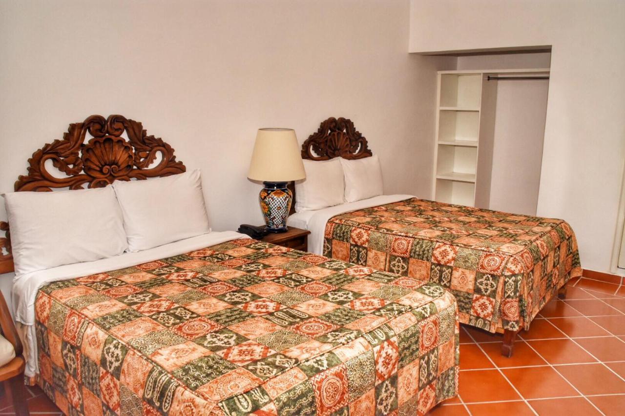 Habitación Doble Estándar con 2 camas dobles