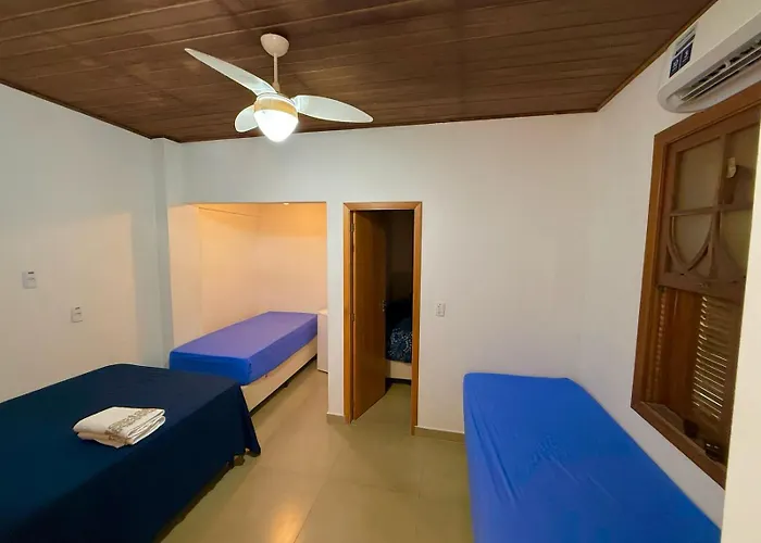 Suítes Pitangueiras - POUSADA FRENTE MAR Guarujá