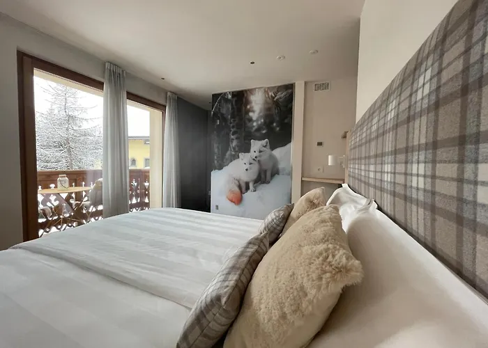 Alpine Rooms&Suites Livigno - Camana Noa -