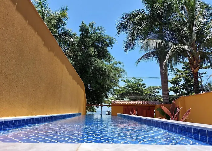 Yara - 4 suítes , Frente Praia, piscina em raia, Churrasqueira, Garagem, Wi-Fi Paraty